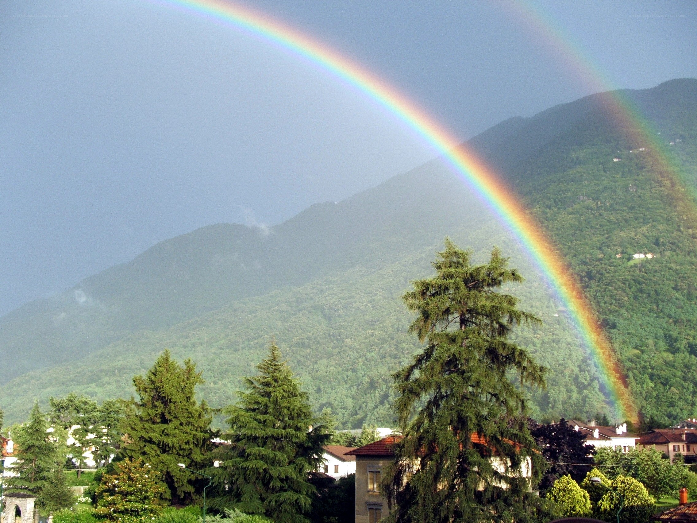 Rainbow over mountain village
