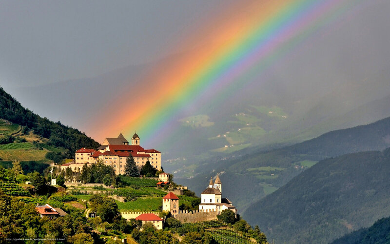 Rainbow over mountain village