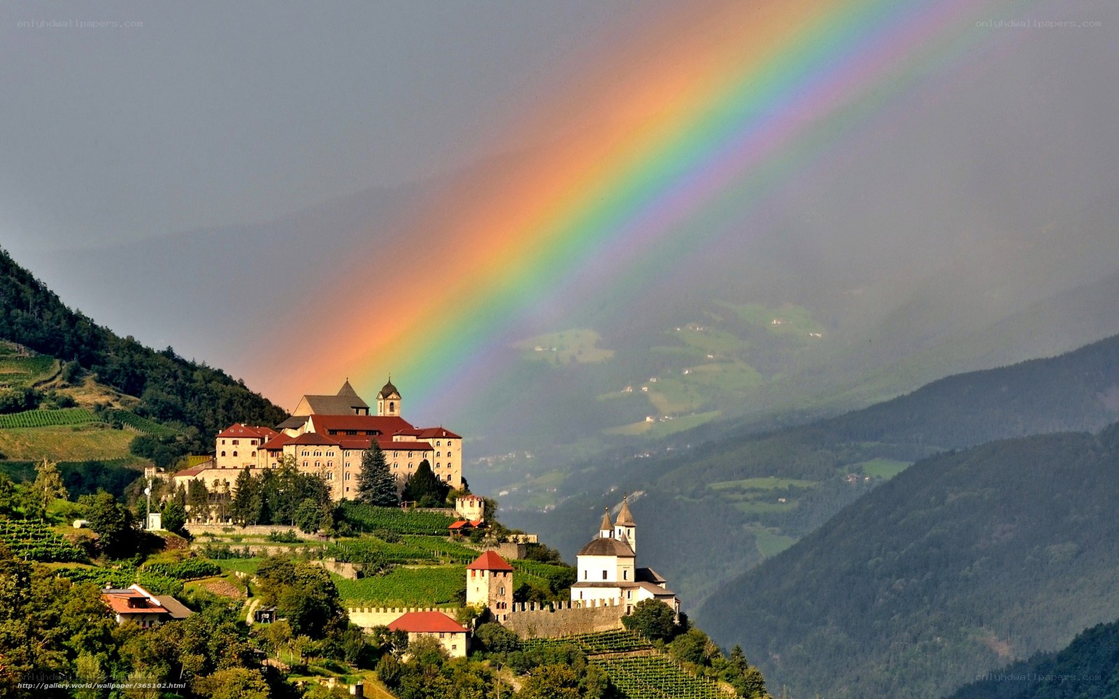 Rainbow over mountain village