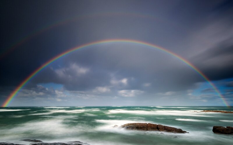 Rainbow over Ocean — Blue, Dramatic, Photograph, Rocks