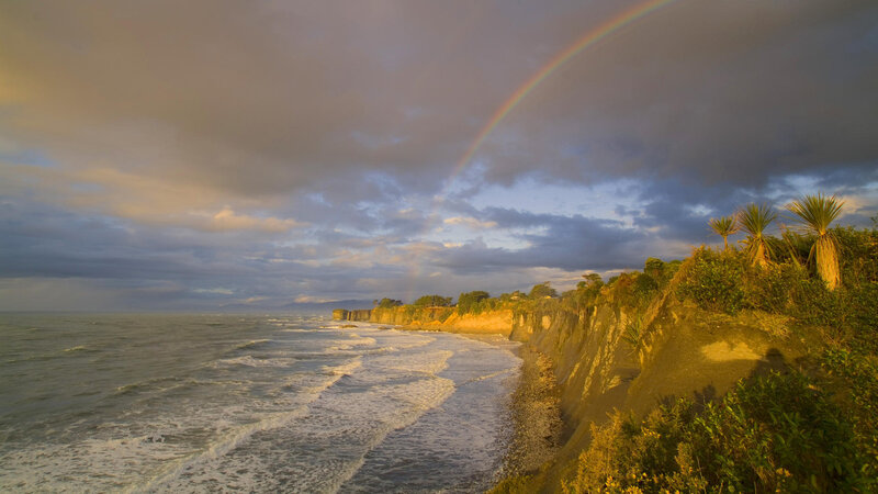Rainbow over Ocean Cliffs