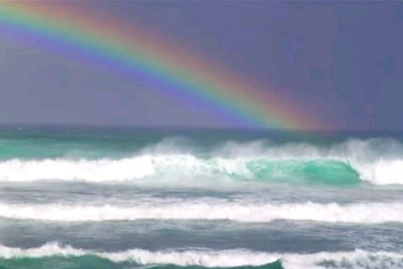 Rainbow over Ocean Waves