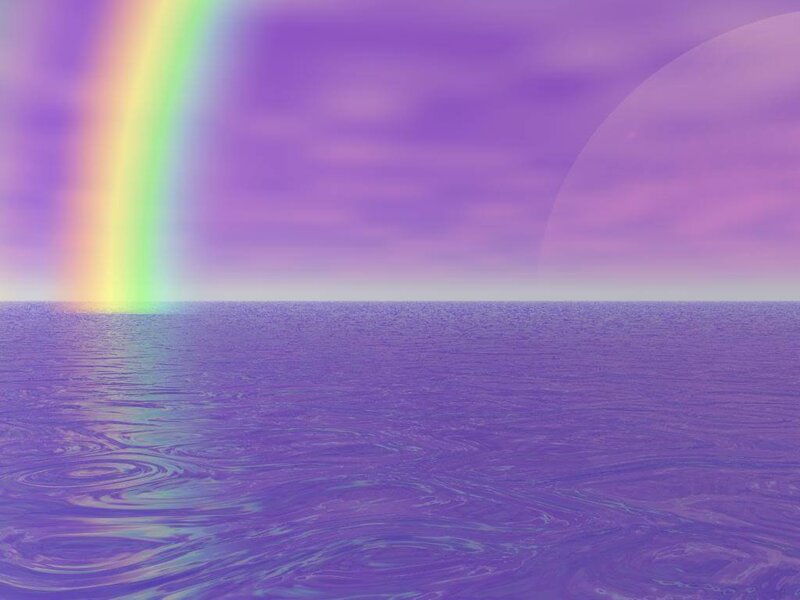 rainbow over purple sea