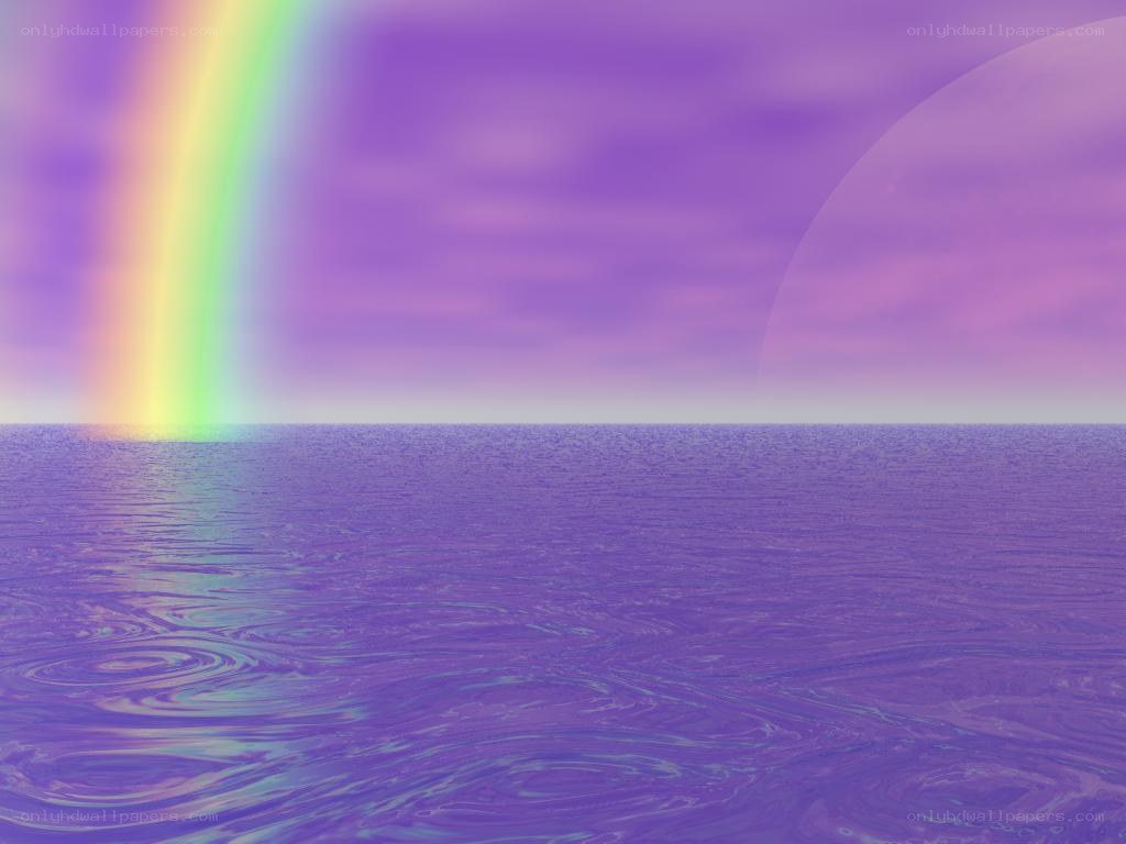 rainbow over purple sea