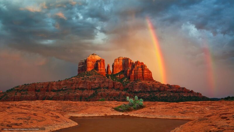 Rainbow over red rock formations