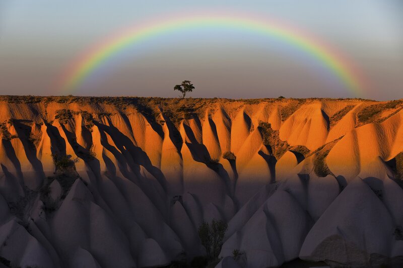 Rainbow over Rock Formations — Orange, Serene