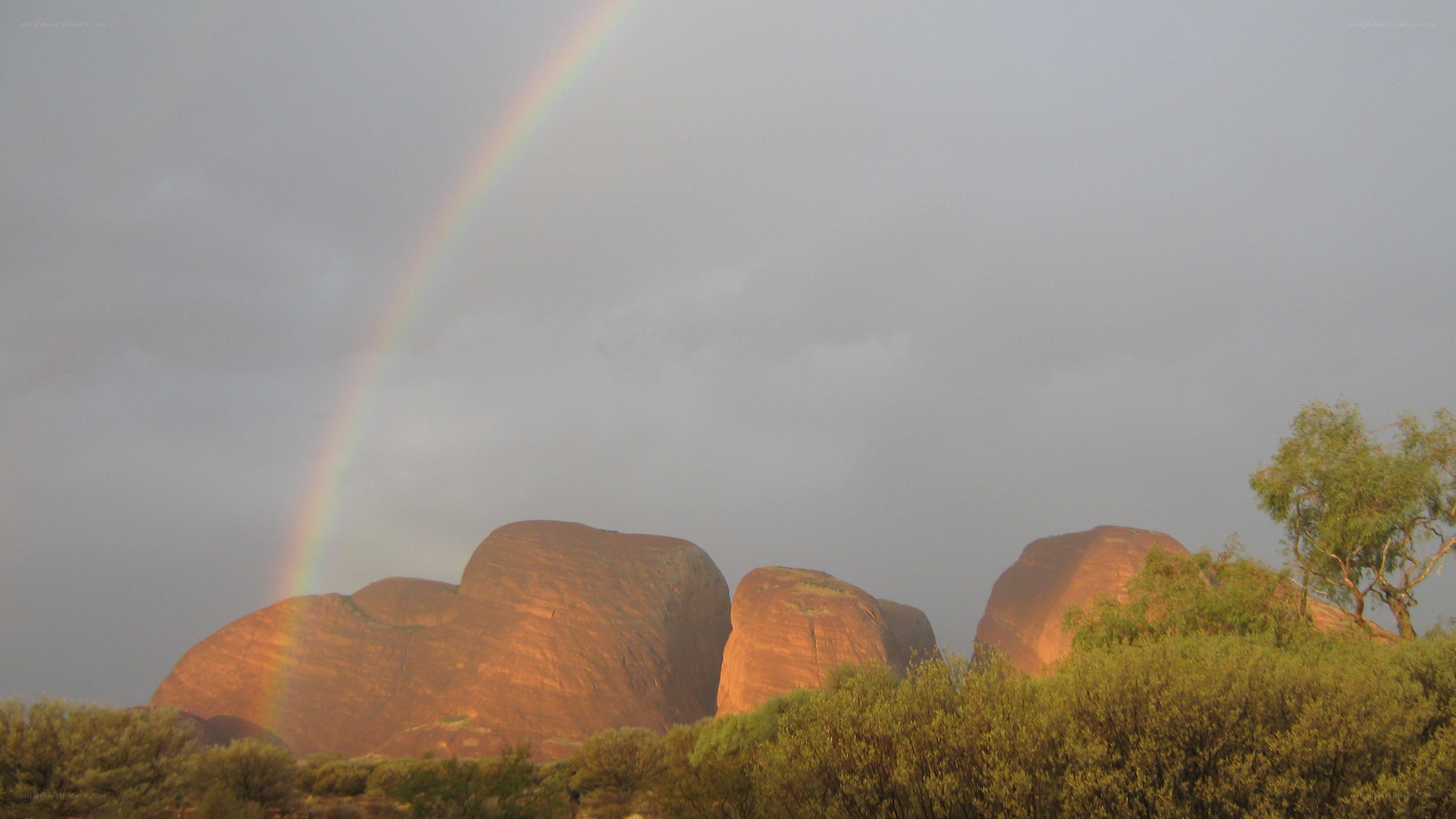 Rainbow over rock formations