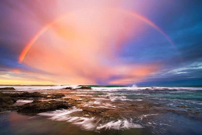 Rainbow over Rocky Shore