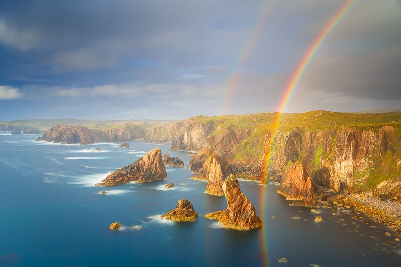 Rainbow over Sea Cliffs