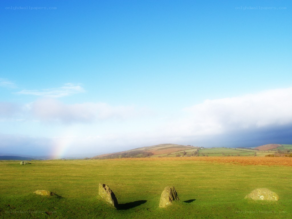 rainbow over stone circle
