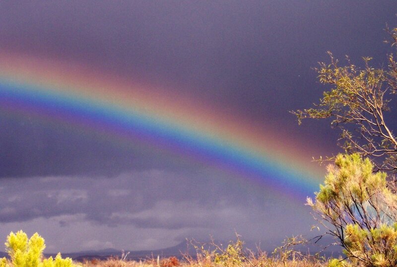 Rainbow over stormy sky