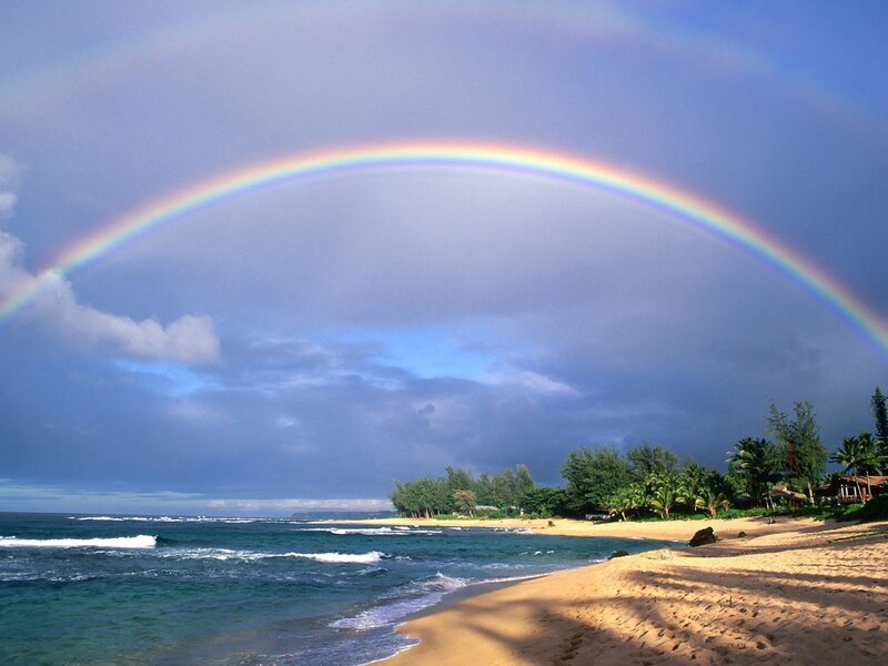 Rainbow over tropical beach