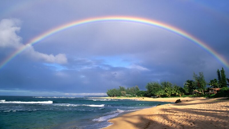 Rainbow over tropical beach