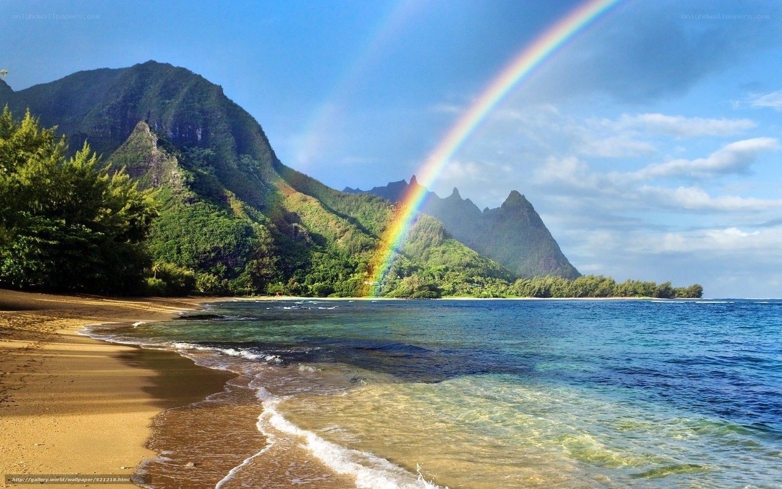 Rainbow over tropical beach