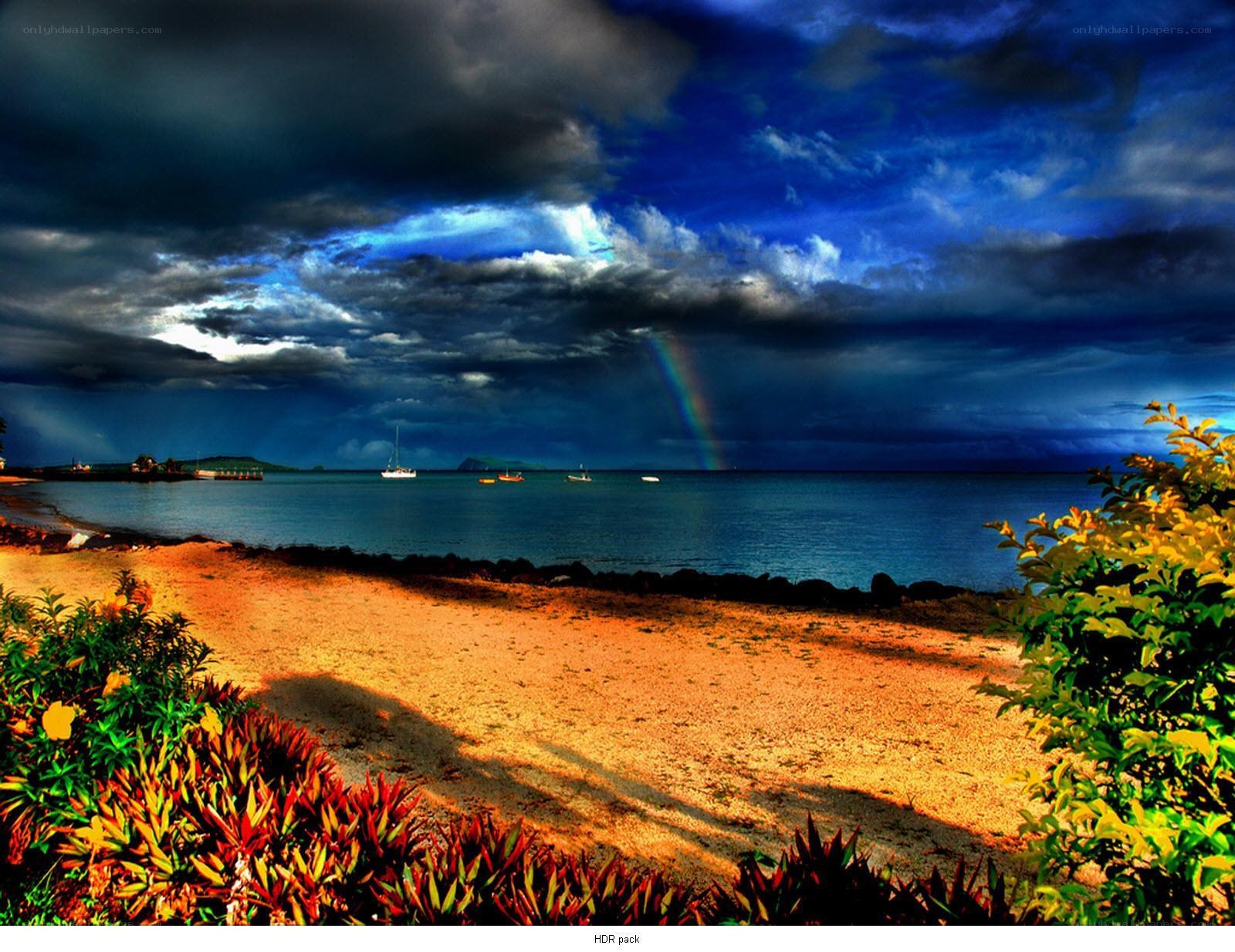 Rainbow over tropical beach
