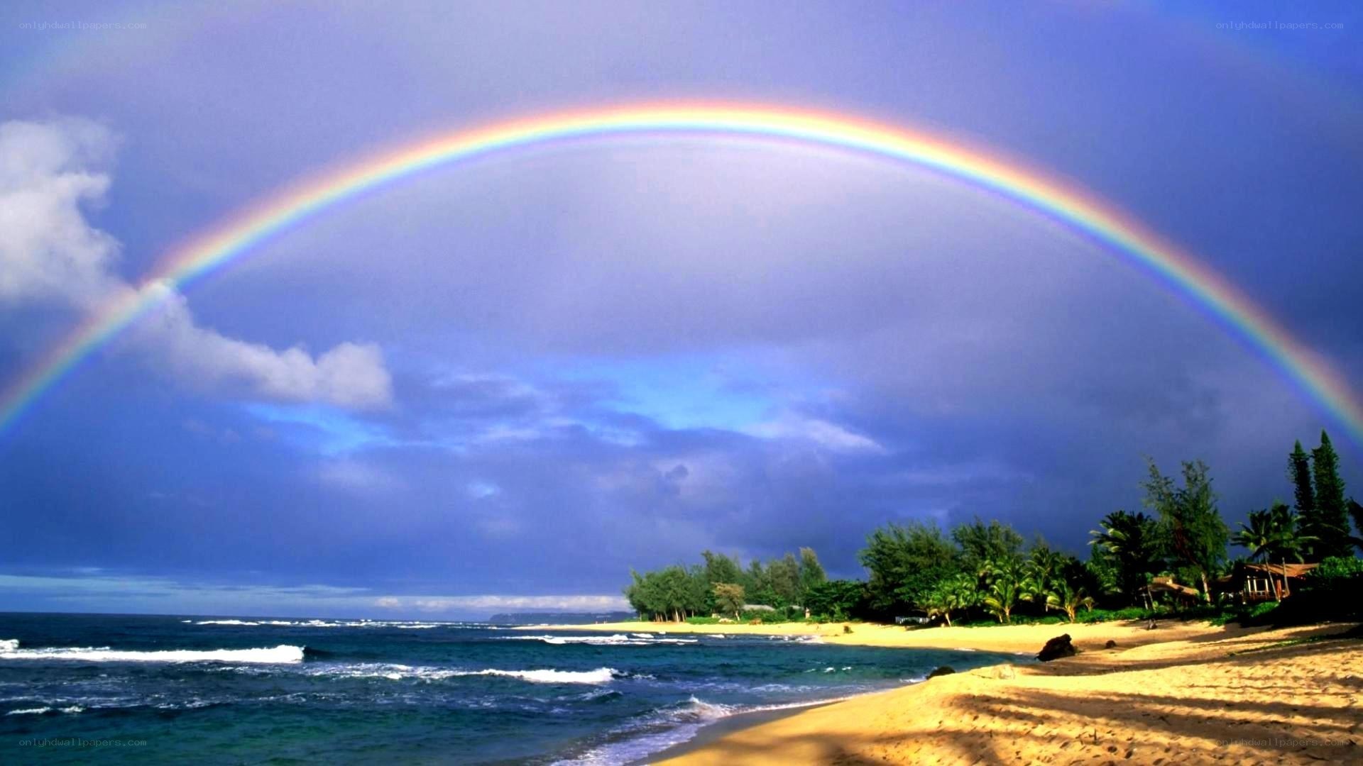 Rainbow over tropical beach