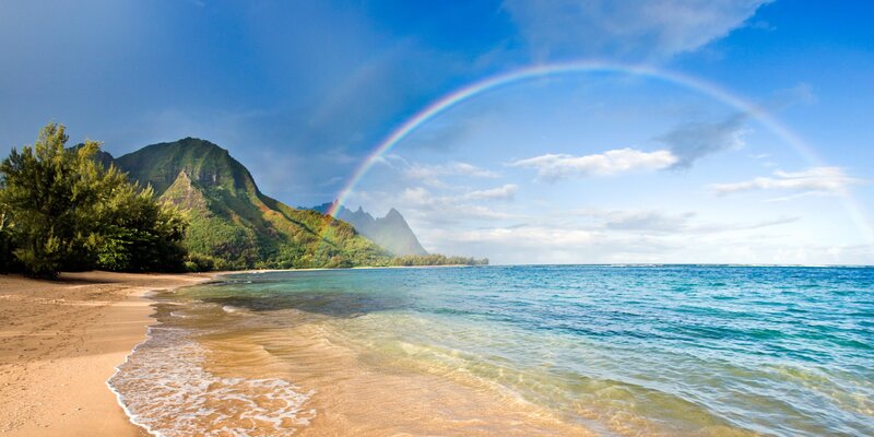Rainbow over Tropical Beach — Blue, Serene, Afternoon, Photograph, Mountain, Ocean, Trees
