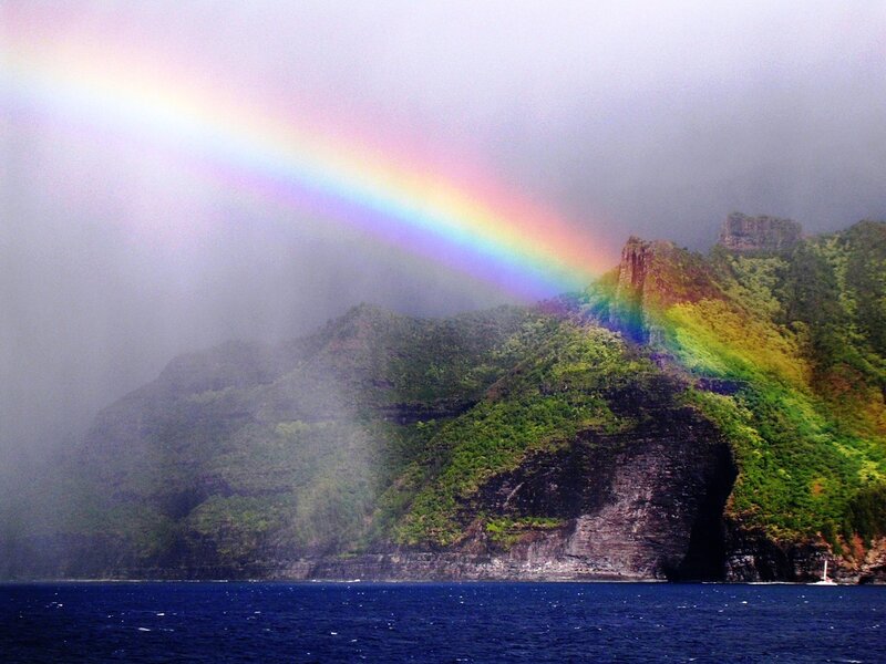 Rainbow over tropical cliffs