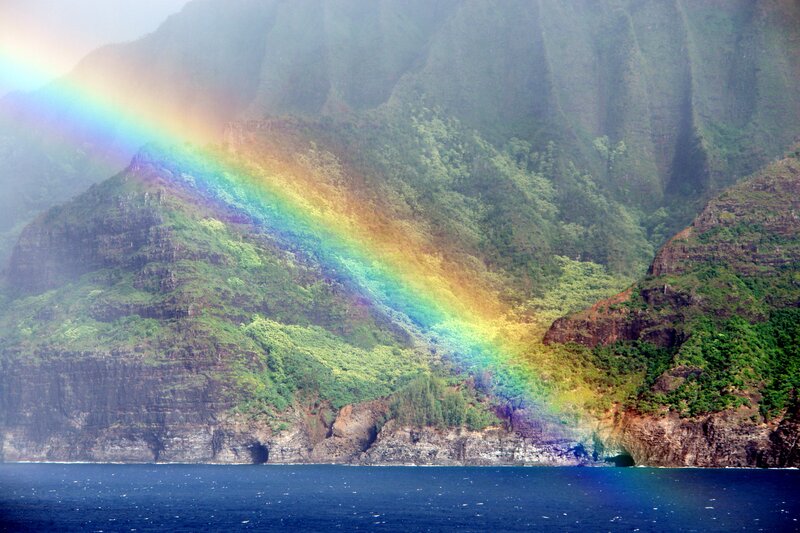 Rainbow over tropical cliffs