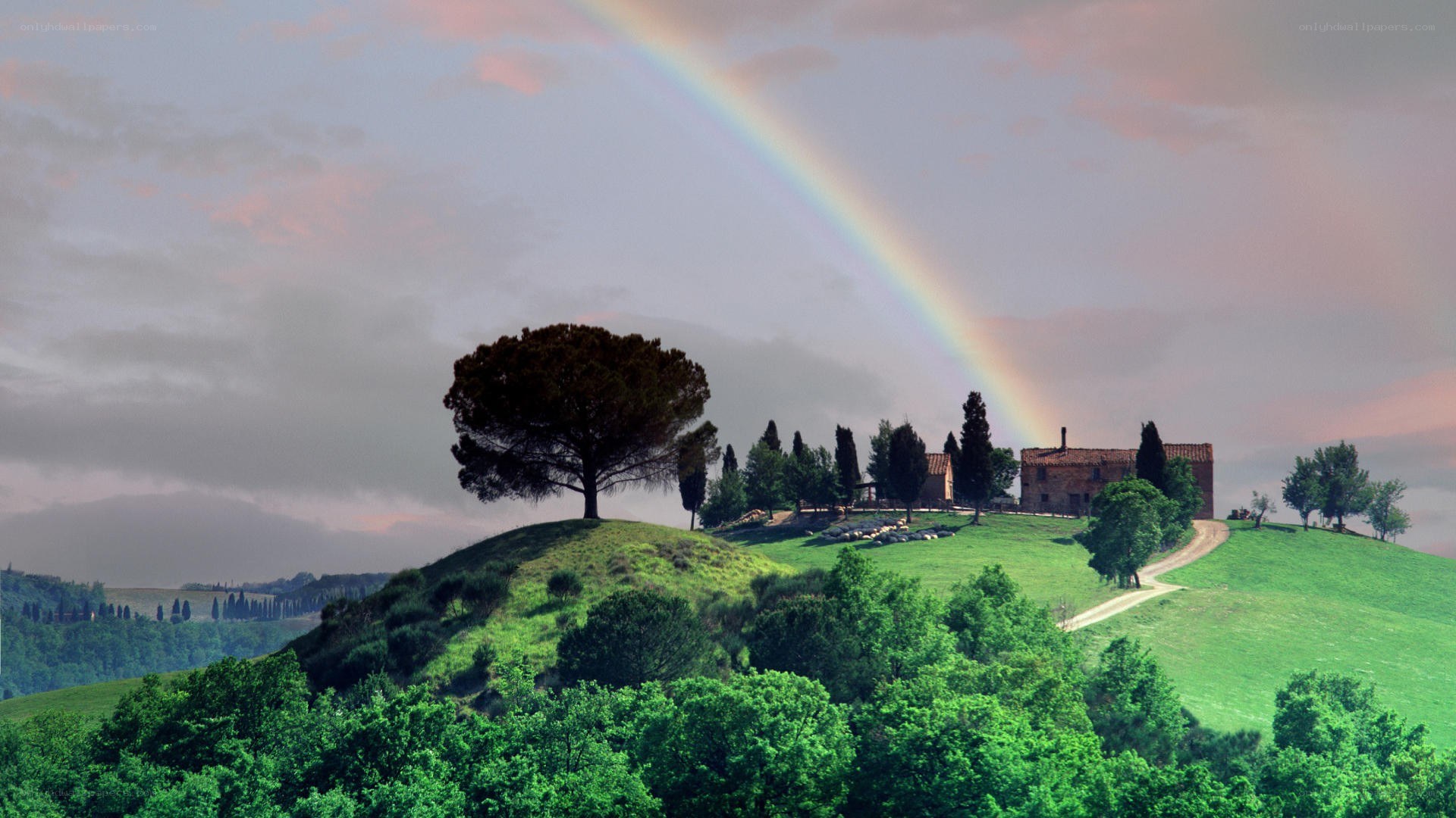Rainbow over Tuscan hills