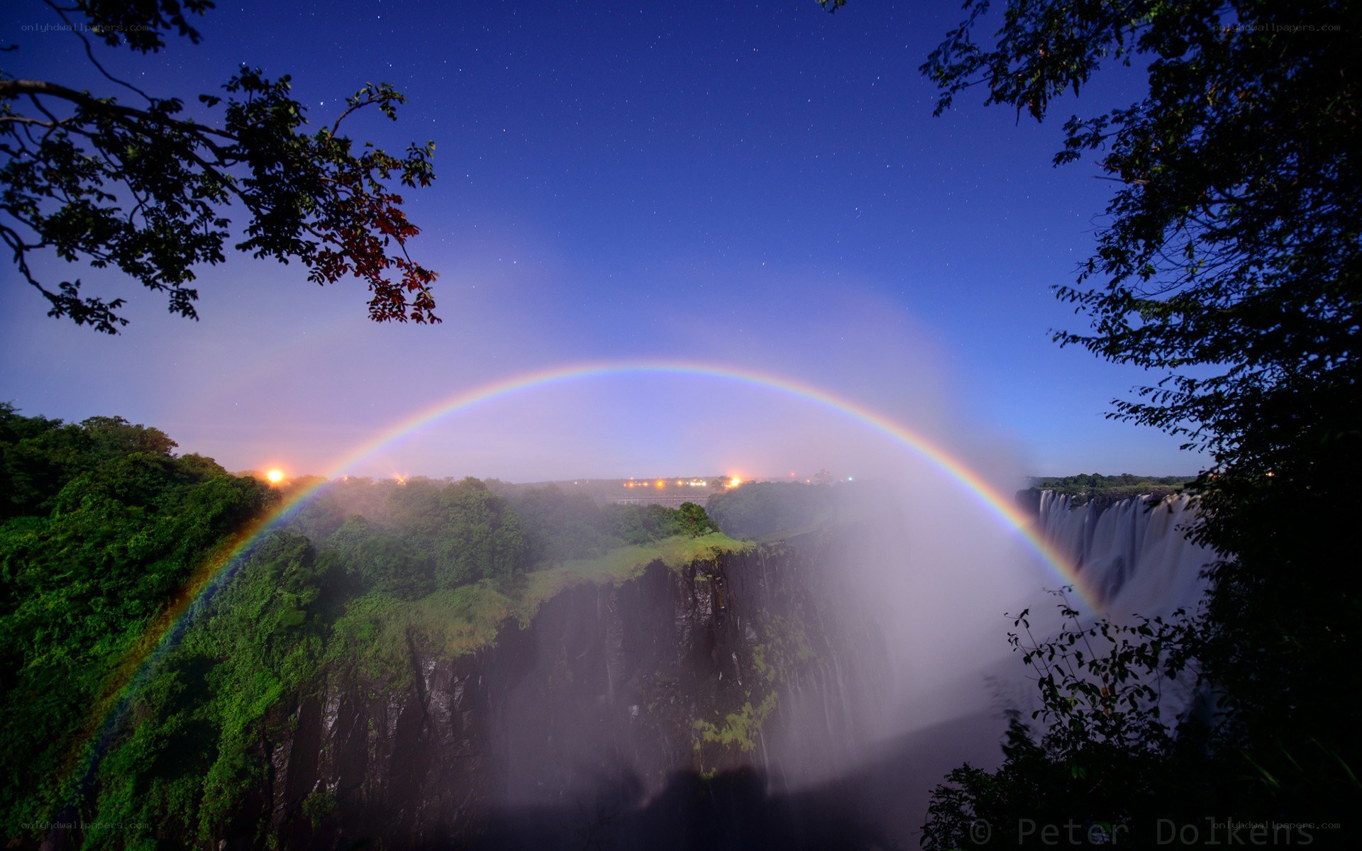Rainbow over Victoria Falls at night