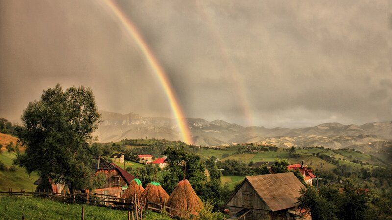 Rainbow over Village — Green, Dramatic, Afternoon, Photograph
