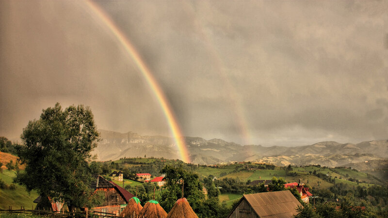 Rainbow over Village — Green, Dramatic, Afternoon
