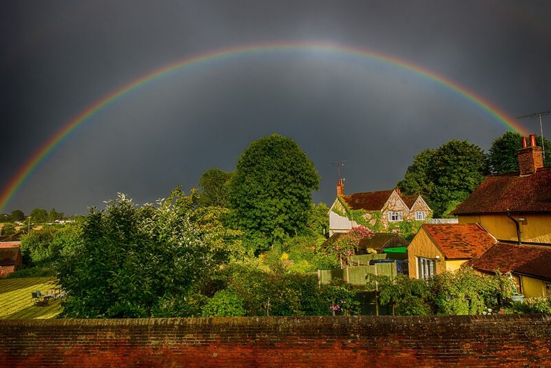 Rainbow over Village — Green, Dramatic