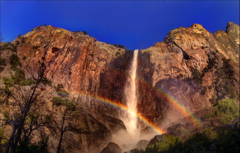 Rainbow over Waterfall — Blue, Dramatic, Afternoon, Photograph, Mountain, Trees