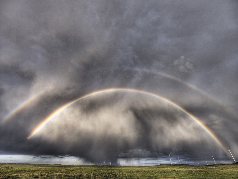 Rainbow over wind turbines