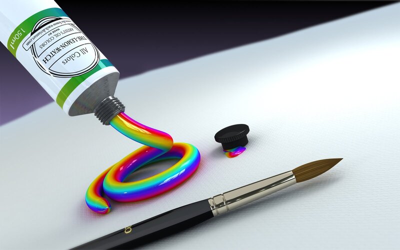 Rainbow paint being squeezed