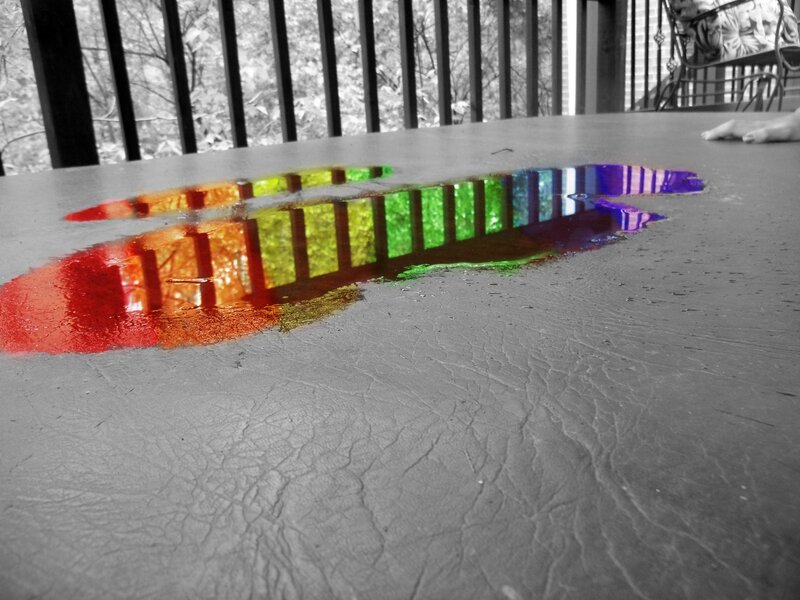 rainbow reflection on table
