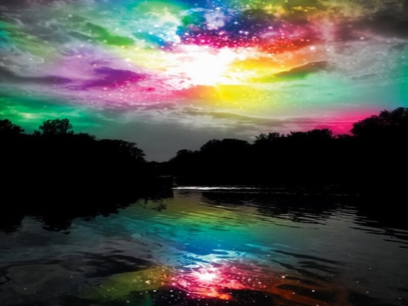rainbow sky over lake