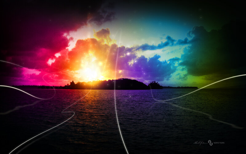rainbow sunset over island