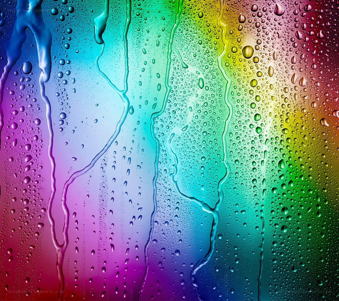 rainbow water droplets on glass