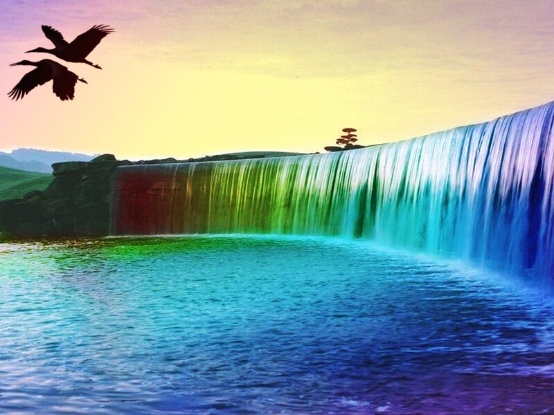 Rainbow waterfall at sunset
