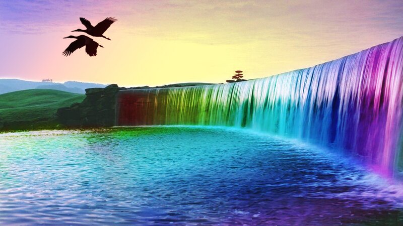 rainbow waterfall at sunset
