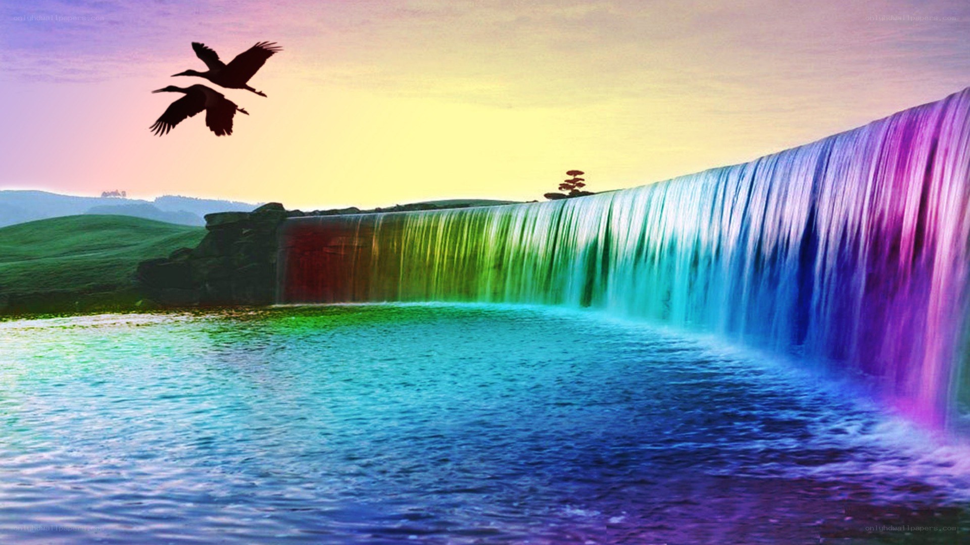 rainbow waterfall at sunset