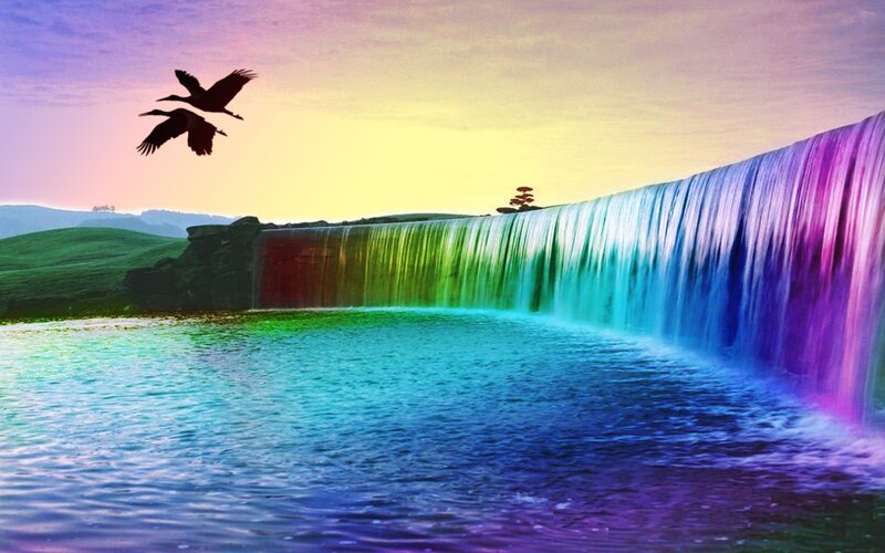 rainbow waterfall at sunset