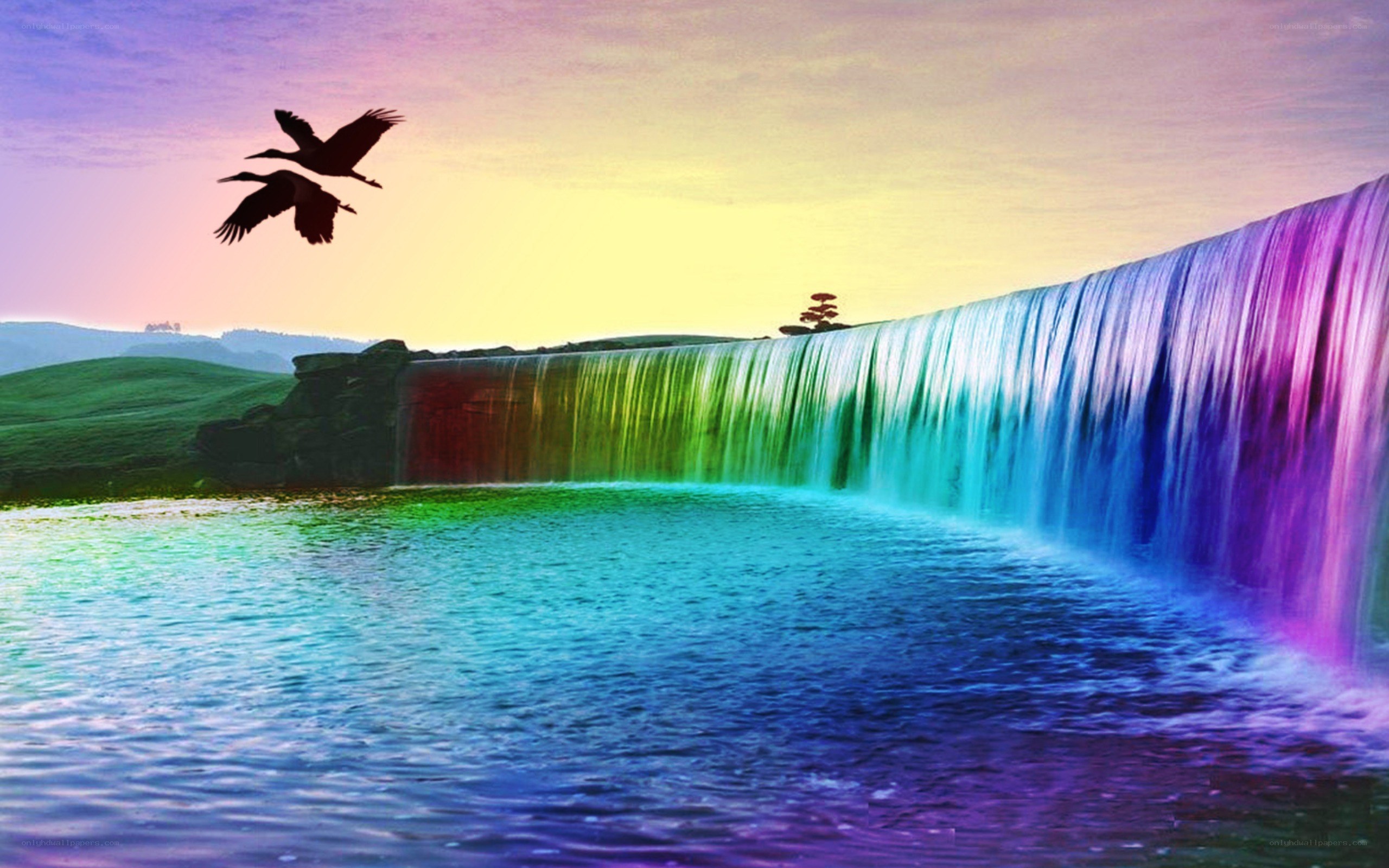 rainbow waterfall at sunset