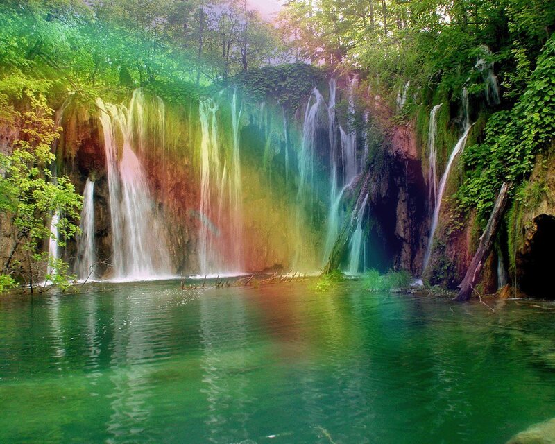 Rainbow waterfall in forest