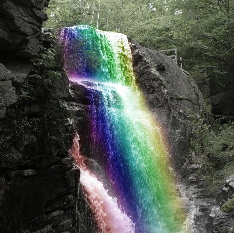 rainbow waterfall in forest