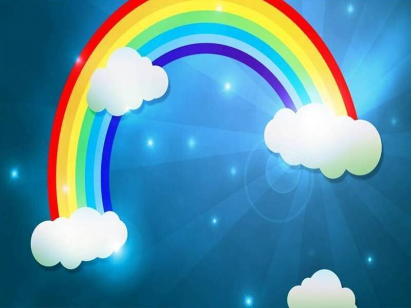 Rainbow with clouds in the sky