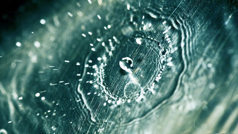 Raindrop on Dark Surface