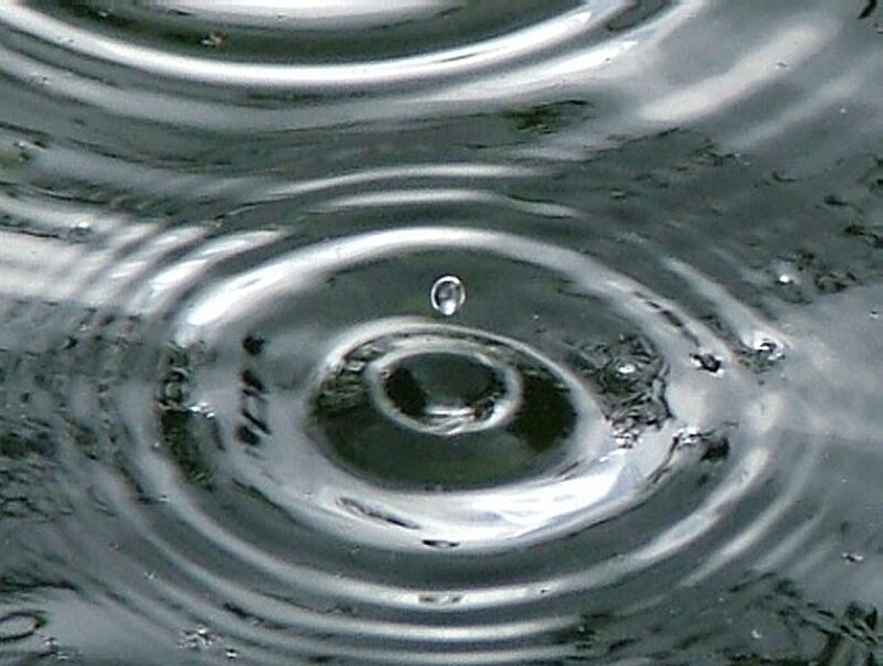 Raindrop on Water Surface