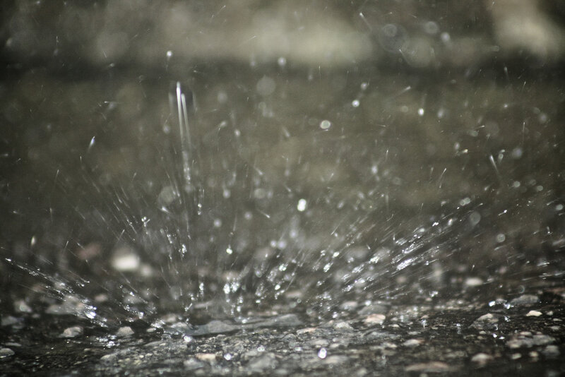 raindrop splashing on pavement