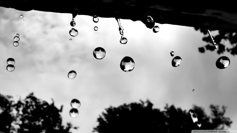 raindrops falling from a roof