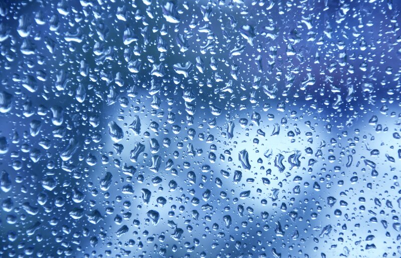 raindrops on a blue surface
