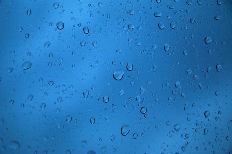 raindrops on a blue surface