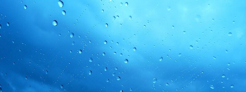 raindrops on a blue surface